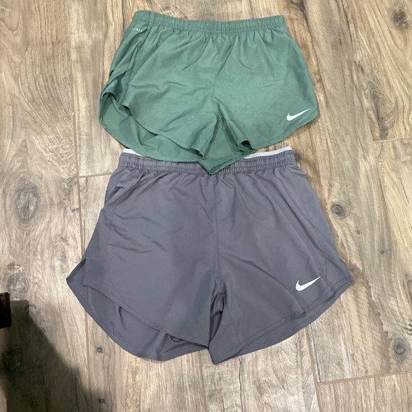 Nike Pants - 2 Nike Dri-Fit running shorts size small.